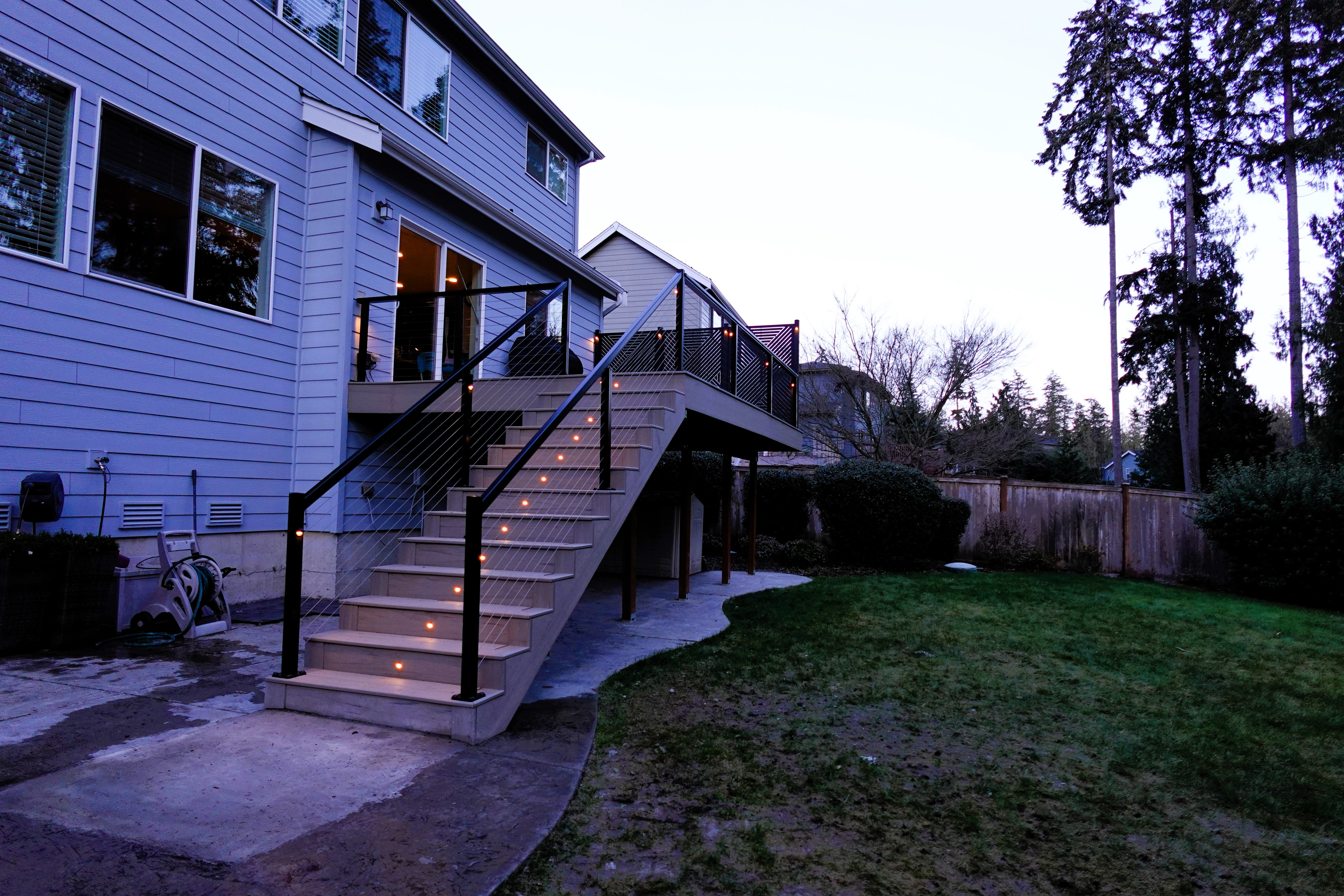 Close-up of TimberTech Reserve Reclaimed Chestnut decking with cable railing