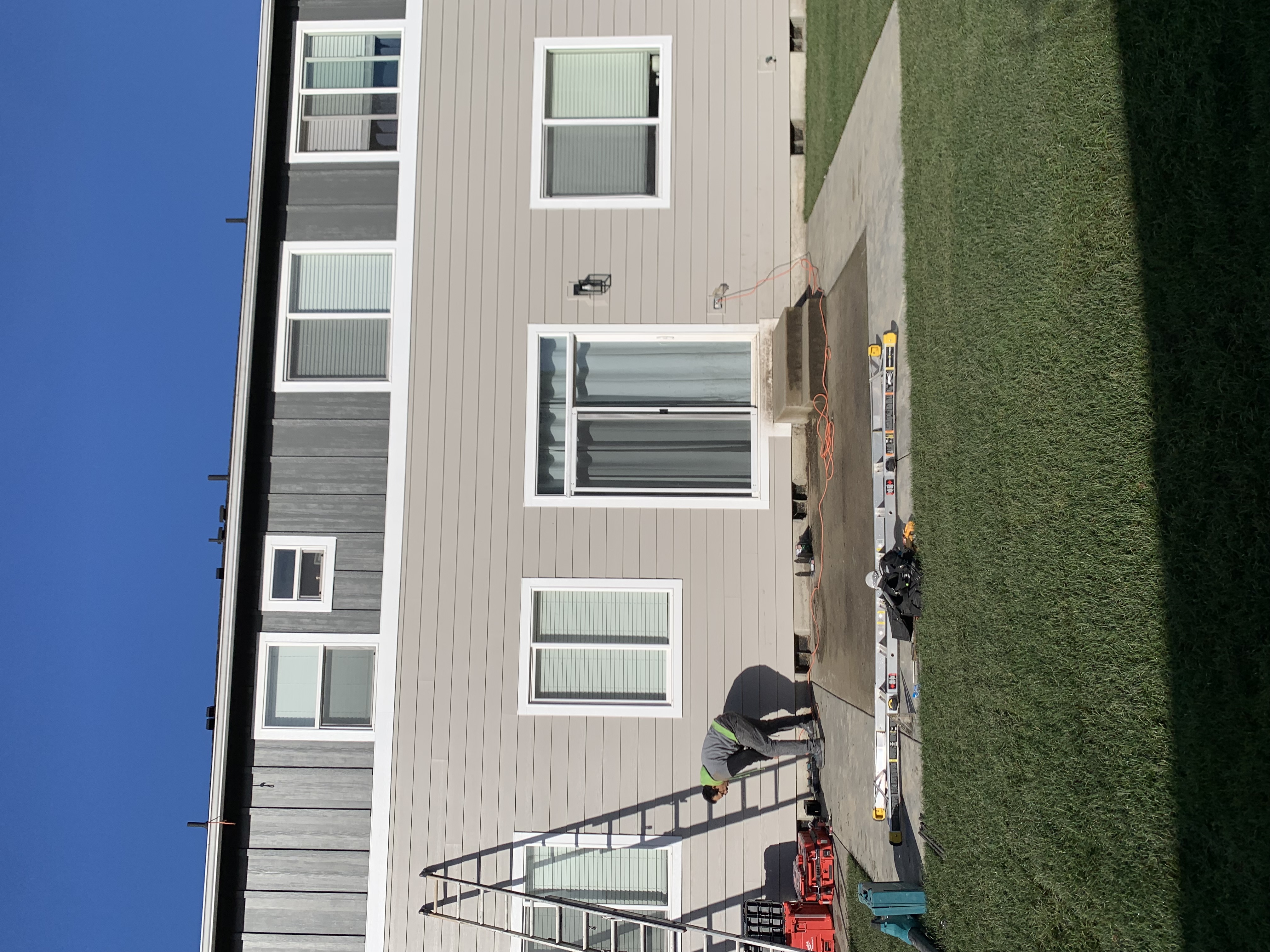 Pressure-treated hemlock rafters and beam with black hardware