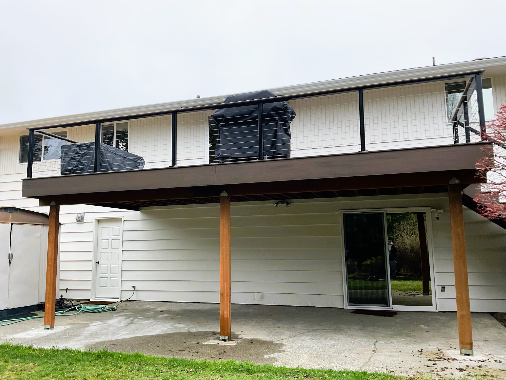 Completed TimberTech deck project with cable railing